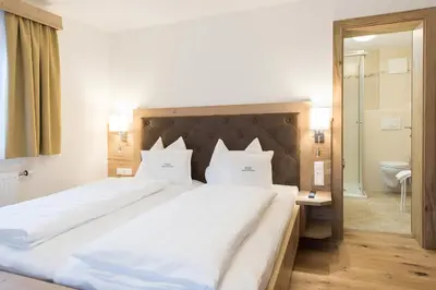 Ein Bett oder Betten in einem Zimmer der Unterkunft Appartement Landhaus KERSCHDORFER