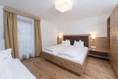Ein Bett oder Betten in einem Zimmer der Unterkunft Appartement Landhaus KERSCHDORFER