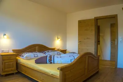 Ein Bett oder Betten in einem Zimmer der Unterkunft Apart Sporer