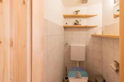Ein Badezimmer in der Unterkunft Chalet - Direkt am 5 Sterne Campingplatz Aufenfeld im Zillertal mit Hallenbad und Sauna