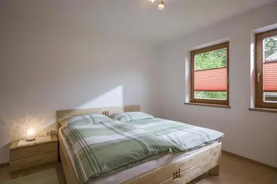Ein Bett oder Betten in einem Zimmer der Unterkunft Ferienwohnung Ager-Bucher