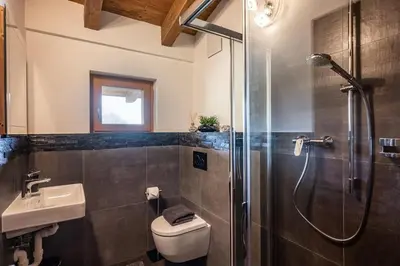 Ein Badezimmer in der Unterkunft Alpenchalet 