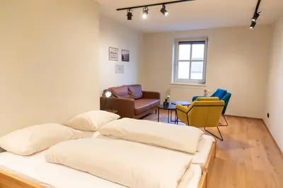 Ein Sitzbereich in der Unterkunft Safestay Kitzbühel Centre