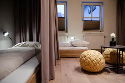 Ein Bett oder Betten in einem Zimmer der Unterkunft Safestay Kitzbühel Centre