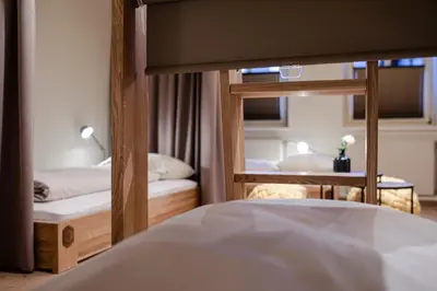 Ein Bett oder Betten in einem Zimmer der Unterkunft Safestay Kitzbühel Centre