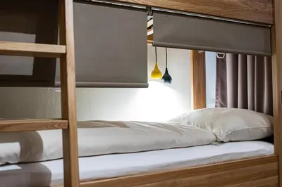 Ein Bett oder Betten in einem Zimmer der Unterkunft Safestay Kitzbühel Centre