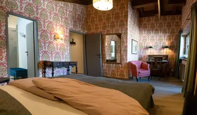 Ein Bett oder Betten in einem Zimmer der Unterkunft RÉSIdence Reith Kitzbühel