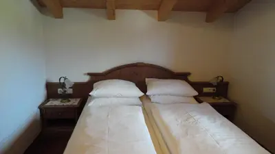 Ein Bett oder Betten in einem Zimmer der Unterkunft Ferienwohnungen Birnbacher
