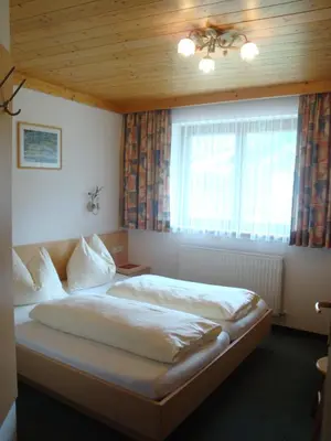 Ein Bett oder Betten in einem Zimmer der Unterkunft Haus Zirmblick