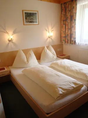 Ein Bett oder Betten in einem Zimmer der Unterkunft Haus Zirmblick