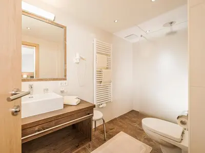Ein Badezimmer in der Unterkunft Hotel Gletscherblick
