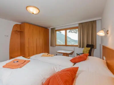 Ein Bett oder Betten in einem Zimmer der Unterkunft Apartment Mitteregg by Interhome