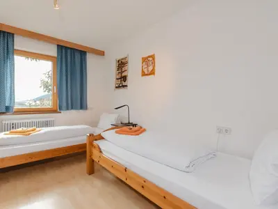 Ein Bett oder Betten in einem Zimmer der Unterkunft Apartment Mitteregg by Interhome