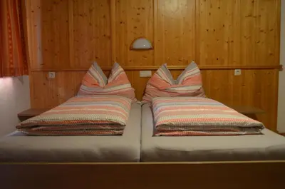 Ein Bett oder Betten in einem Zimmer der Unterkunft Kienberghof