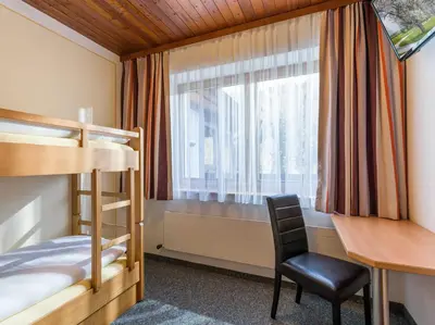 Ein Bett oder Betten in einem Zimmer der Unterkunft Haus am Wildbach