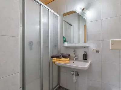 Ein Badezimmer in der Unterkunft Haus am Wildbach