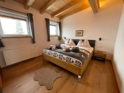 Ein Bett oder Betten in einem Zimmer der Unterkunft Marias Alpen Apartment by Alpine Host Helpers