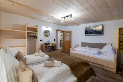 Ein Bett oder Betten in einem Zimmer der Unterkunft Kummererhof