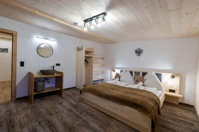 Ein Bett oder Betten in einem Zimmer der Unterkunft Kummererhof