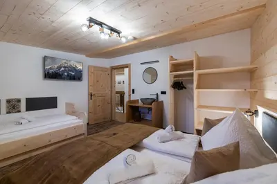 Ein Bett oder Betten in einem Zimmer der Unterkunft Kummererhof