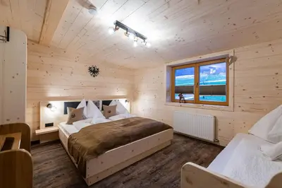 Ein Bett oder Betten in einem Zimmer der Unterkunft Kummererhof