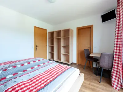 Ein Bett oder Betten in einem Zimmer der Unterkunft Holiday Home Brixen Valley Ski Bus Access