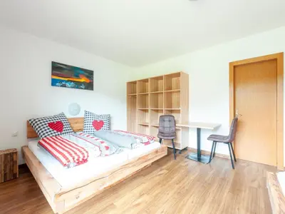 Ein Bett oder Betten in einem Zimmer der Unterkunft Holiday Home Brixen Valley Ski Bus Access