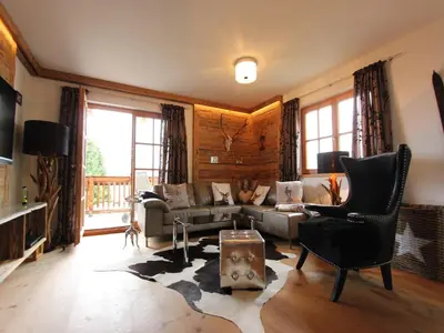 Ein Sitzbereich in der Unterkunft Dream apartment in the Kitzbühler Alps ski area
