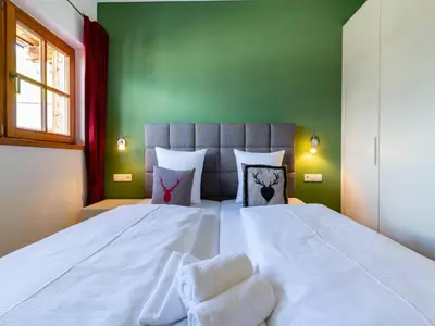 Ein Bett oder Betten in einem Zimmer der Unterkunft Apartment with Sauna and Ski In Out