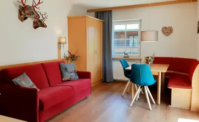 Ein Sitzbereich in der Unterkunft Haus Veronika - Appartements by Miha