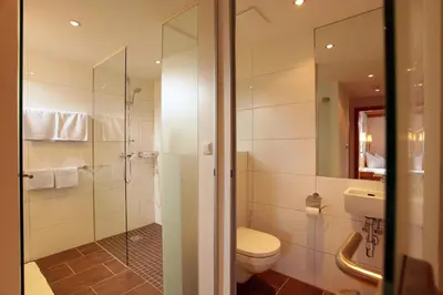 Ein Badezimmer in der Unterkunft Haus Veronika - Appartements by Miha