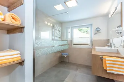 Ein Badezimmer in der Unterkunft Apartments Salzburgerhof
