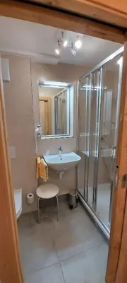 Ein Badezimmer in der Unterkunft Apartments Salzburgerhof