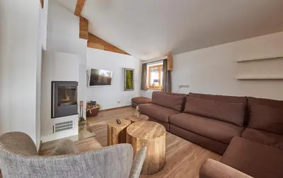 Ein Sitzbereich in der Unterkunft Glemm Lodge Apartments - JOKER CARD im Sommer inklusive