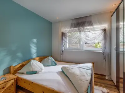 Ein Bett oder Betten in einem Zimmer der Unterkunft Appartement Bergblick
