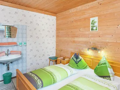 Ein Bett oder Betten in einem Zimmer der Unterkunft Chalet in Alps near Ski Slopes
