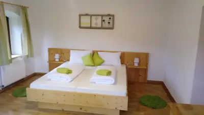 Ein Bett oder Betten in einem Zimmer der Unterkunft Ferienhaus Annelies