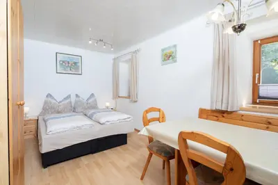 Ein Bett oder Betten in einem Zimmer der Unterkunft Ferienwohnung Lechner-Kaltenhauser