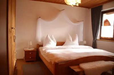 Ein Bett oder Betten in einem Zimmer der Unterkunft Ferienwohnung Lavendel