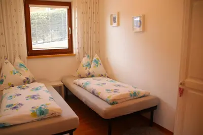 Ein Bett oder Betten in einem Zimmer der Unterkunft Ferienwohnung Lavendel
