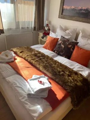 Ein Bett oder Betten in einem Zimmer der Unterkunft Residence Cocoon