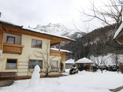 Alluring Apartment with Swimming Pool in Waidring Tyrol im Winter