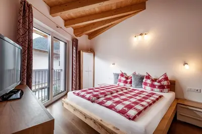 Ein Bett oder Betten in einem Zimmer der Unterkunft Ferienwohnung Riedmann