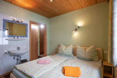 Ein Bett oder Betten in einem Zimmer der Unterkunft Moser