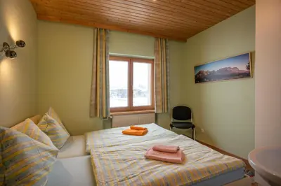 Ein Bett oder Betten in einem Zimmer der Unterkunft Moser