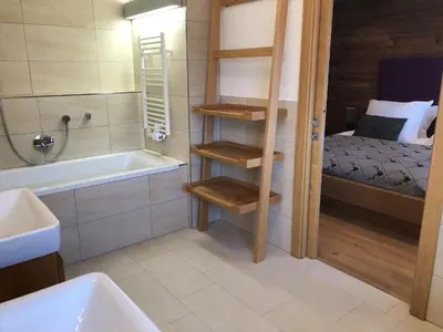 Ein Bett oder Betten in einem Zimmer der Unterkunft The LODGE, Saalbach