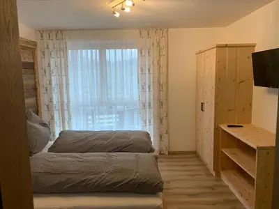 Ein Bett oder Betten in einem Zimmer der Unterkunft Apart Wexwood