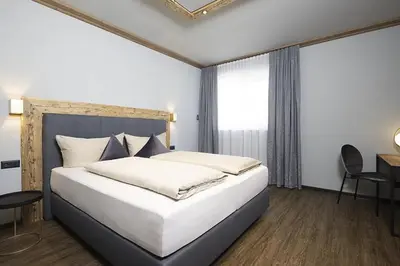 Ein Bett oder Betten in einem Zimmer der Unterkunft Apart Bogner