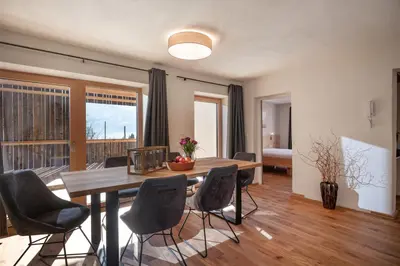 Ein Sitzbereich in der Unterkunft Apartments Zauberberg