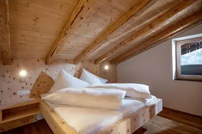 Ein Bett oder Betten in einem Zimmer der Unterkunft Apartments Zauberberg